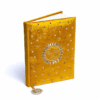 Cuaderno de terciopelo amarillo con sol