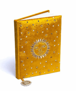 Cuaderno de terciopelo amarillo con sol